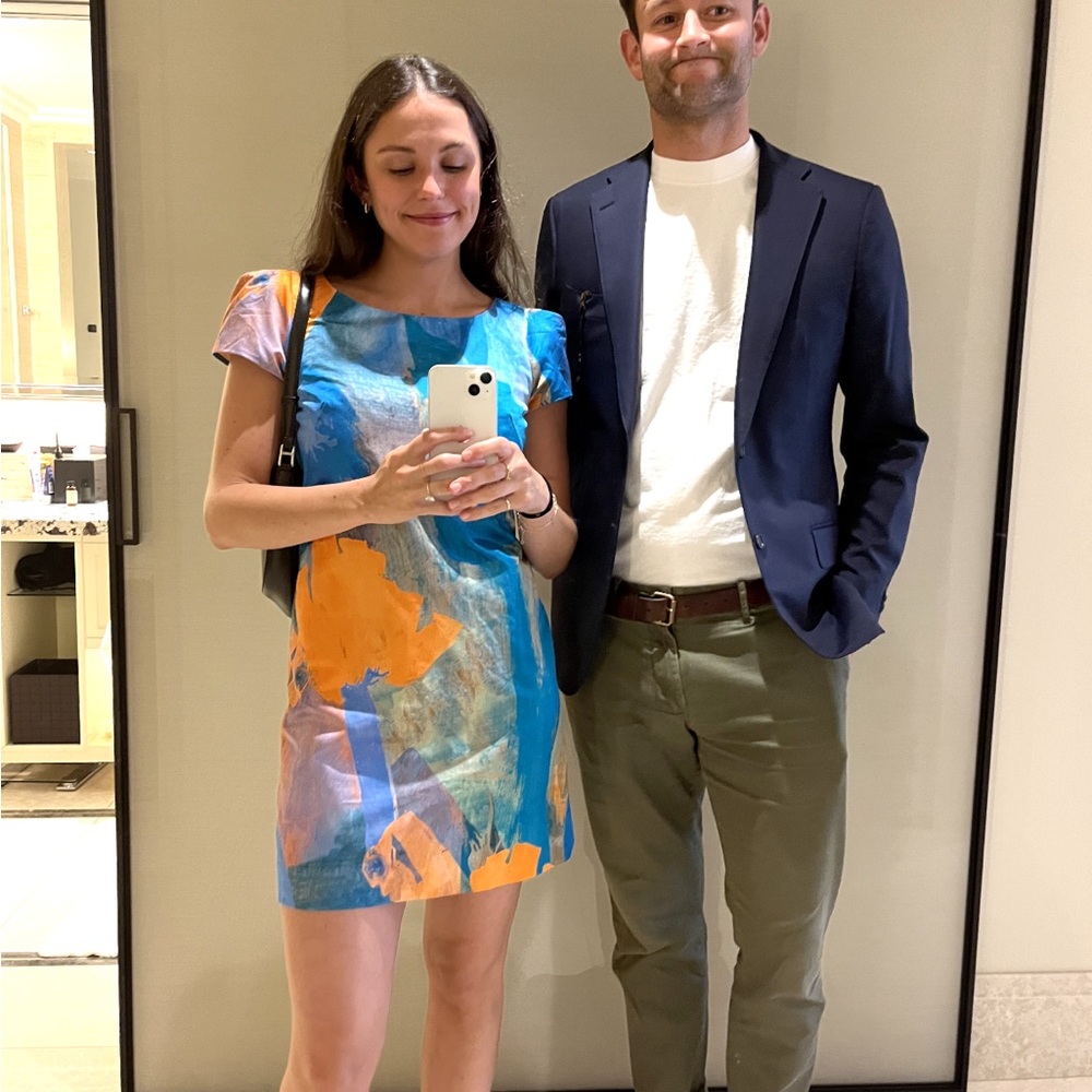 Milly multi colored mini dress with cap sleeves.